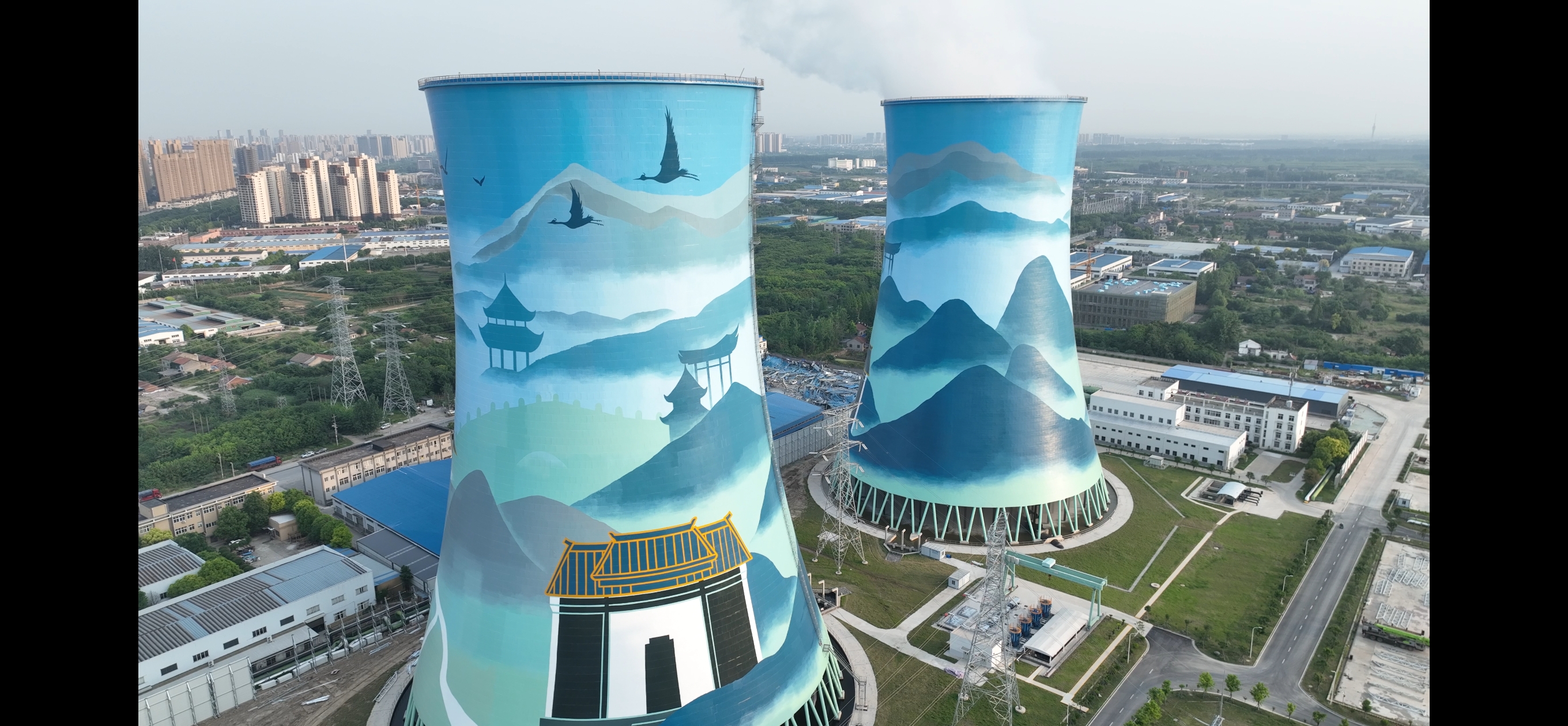 雙塔煥彩繪荊楚 宏順匠心筑綠標——荊州電廠冷卻塔成工業新名片